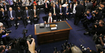Former FBI Director James Comey is seated prior to testifying before a Senate Intelligence Committee hearing on Russia's alleged interference in the 2016 U.S. presidential election on Capitol Hill in Washington, U.S., June 8, 2017. REUTERS/Jim Bourg TPX IMAGES OF THE DAY